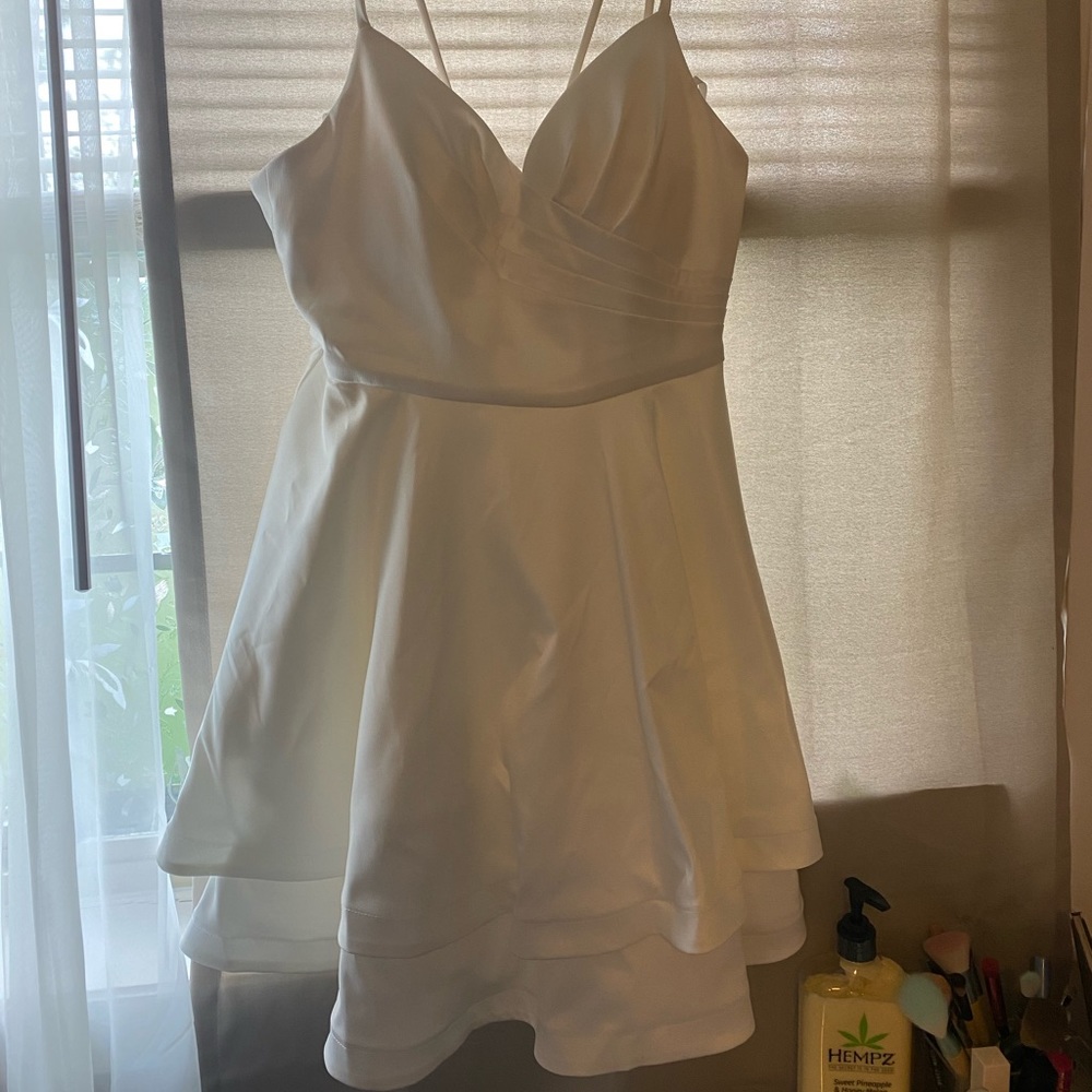 Size 9 dress from Dillards worn once for pictures it has pockets!